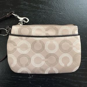 NWOT Tan Coach Wristlet  with Light Pink lining